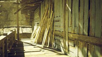 CGI Wooden structures line a rustic pathway in an old village setting video