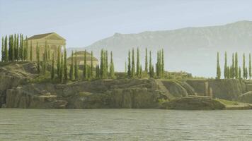 CGI Ancient architecture and lush greenery along a serene body of water video