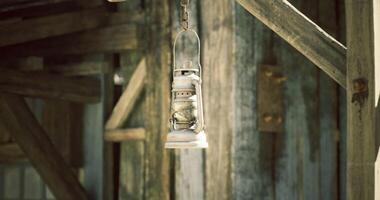 CGI Rustic lantern hanging on wooden structure in an old building video