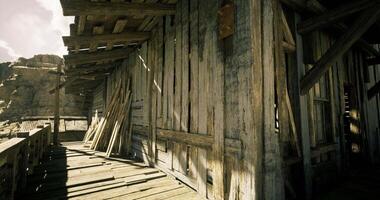 CGI Rustic wooden cabin with weathered planks in a mountainous area during daytime video