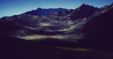 CGI Vast mountain valley under a clear blue sky during the daytime video