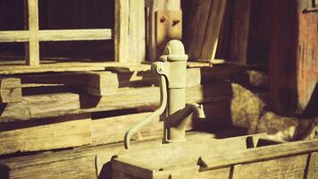 CGI Old fashioned water pump in rustic wooden setting surrounded by nature video