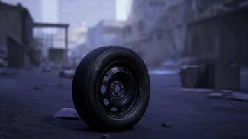 CGI Abandoned tire on deserted street in urban decay during twilight hours video