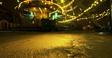 CGI Bright lights illuminate carnival rides at night creating a festive atmosphere video