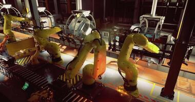 CGI Advanced robotic arms working on an assembly line in a modern factory video