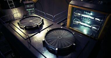 CGI Details of futuristic technology in a dimly lit mechanical environment video