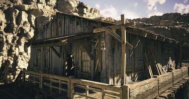 CGI Wooden building on a raised platform surrounded by rocky landscape video