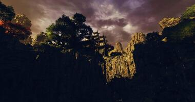 CGI Breathtaking mountain landscape with ancient architecture in China at dusk video
