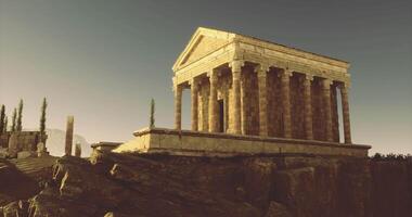 CGI Ancient temple structure on rocky terrain during sunset in a serene landscape video