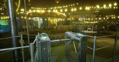 CGI Nighttime at the amusement park with bright lights and a carousel video