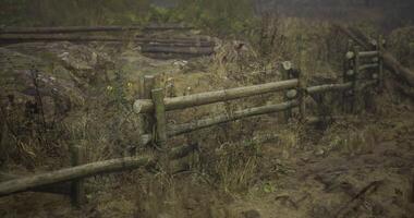 CGI Rustic wooden fence in a rural landscape during foggy weather video