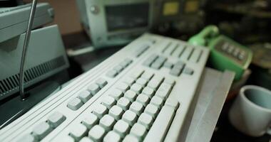 CGI Vintage technology workspace with retro keyboard and gadgets video
