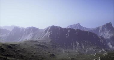 CGI Majestic mountain landscape with rocky terrain under a clear sky video