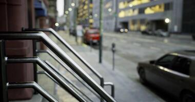 CGI Urban streetscape with handrails and parked cars at dusk video