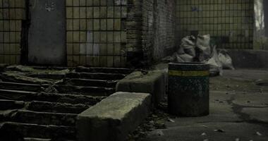 CGI Abandoned indoor area with discarded trash and debris in urban environment video