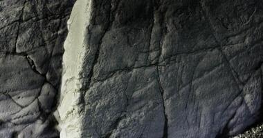 CGI Rock formation revealing intricate textures and patterns in a natural setting video