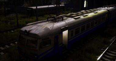 CGI Old abandoned train resting on overgrown tracks in a forgotten location video