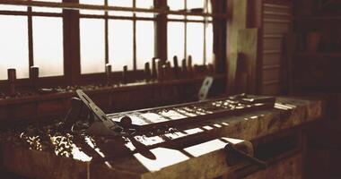 CGI Woodworking tools on a workbench in a rustic workshop during daylight hours video