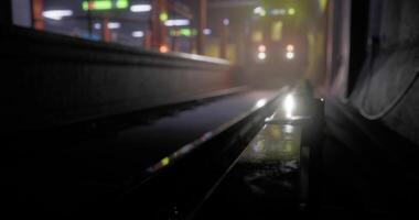 CGI Low angle view of train tracks illuminated by distant lights at night video