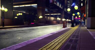 CGI Vibrant city street at night with glowing lights and empty pathway video