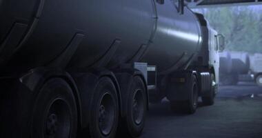 CGI Truck transporting liquid cargo in a warehouse during evening hours video
