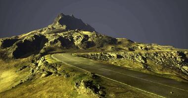 CGI Mountain road winding through rugged terrain on a clear day with stunning views video