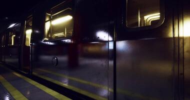 CGI Metro train at a dimly lit station with glowing lights reflecting on surfaces video