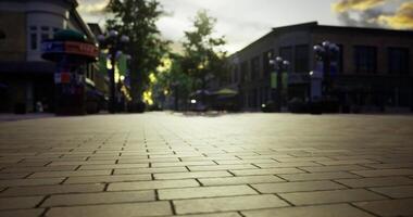 CGI Quiet street with brick pavement during sunset in a lively urban area video
