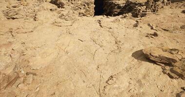 CGI Desert view of weathered rocks and dry land under a bright sky video