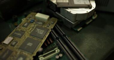 CGI Exploring old computer components with circuit boards and hard drives video