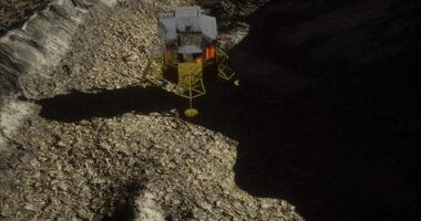 CGI Lunar lander explores the rugged terrain of the moon during a quiet night video