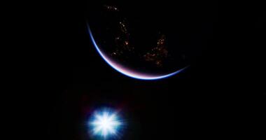 CGI Planet Earth illuminated by city lights with a bright star in the foreground video