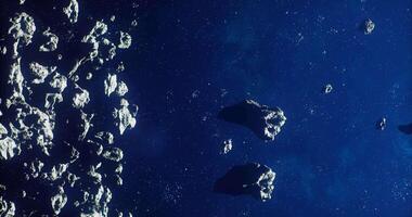CGI Asteroids captured in deep space with stunning details of rocky surfaces video