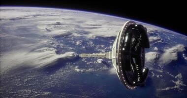 CGI Space station orbiting Earth with cloud formations and the ocean visible video