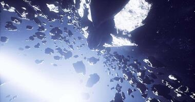 CGI Stunning view of distant asteroids floating in cosmic space video