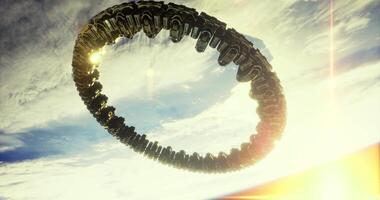 CGI Vortex structure hovering above clouds during sunset with golden sunlight video