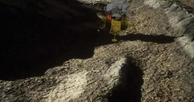 CGI Lunar lander exploring the moons rocky terrain during twilight hours video