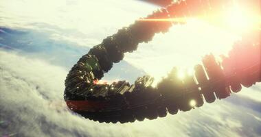 CGI Unique space structure orbits Earth with sunlight glinting at dawn video