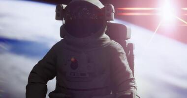 CGI An astronaut conducts a spacewalk while floating in low Earth orbit video