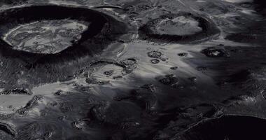 CGI Detailed view of lunar surface showcasing craters and shadows at night video