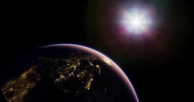 CGI View of Earth illuminated by city lights with the sun shining above video
