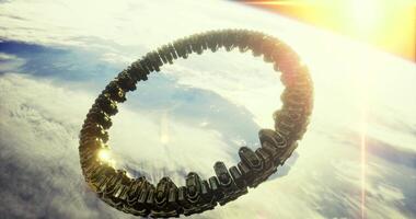 CGI Satellite structure orbits Earth with sunlight reflecting off its surface video