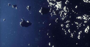 CGI Asteroids drifting in the vastness of space offer a celestial view video
