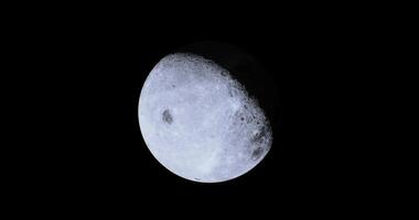 CGI Majestic moon glowing in the night sky over a quiet landscape video