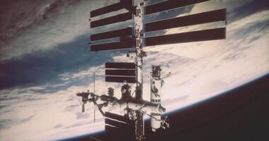 CGI View of the International Space Station orbiting Earth in low sunlight video
