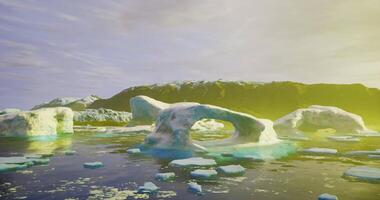 CGI Colorful ice formations on a calm ocean with a mountainous background video