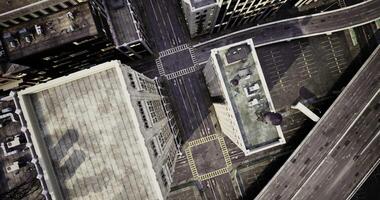 CGI Urban intersection in a modern city captured from above during daytime video