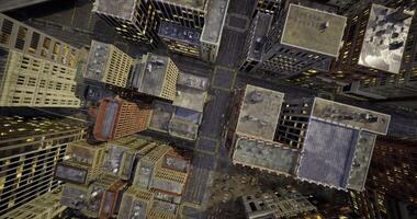 CGI Urban skyline perspective showcasing city blocks at night with glowing lights video