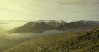 CGI Majestic mountain landscape illuminated by soft golden light during sunset video
