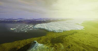 CGI Scenic view of a glacier melting into the ocean at dawn in Greenland video